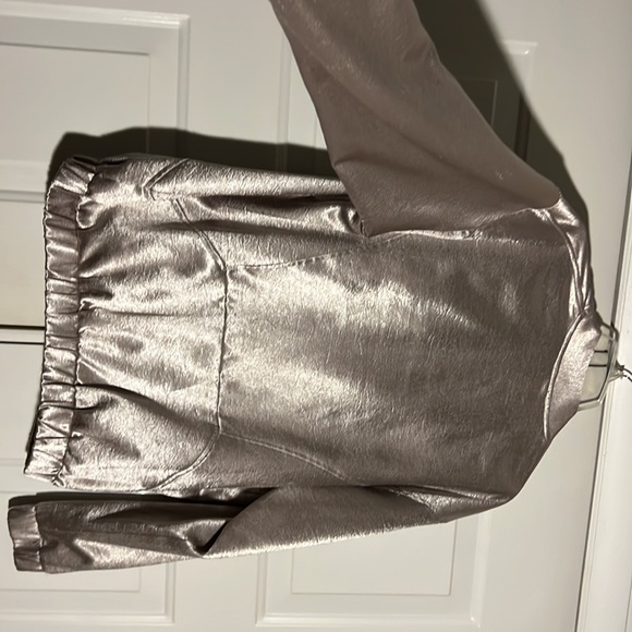 Topshop bomber jacket is more of a satin silver. - Picture 3 of 4